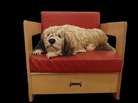 Dog in a Red Chair