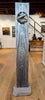 Beacon-wood-sculpture-artist-Cie-Hoover-Tall vertical sculpture with circular design 