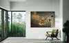 Free-to-Roam-Eagle-contemporary-open-space-in-home-mixed-media-wood-art-artist-Cie-Hoover-Eagle artwork on a wall in a modern room with large windows and a chair.