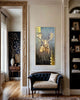 Free-to-Roam-Moose-home-mixed-media-wood-art-artist-Cie-Hoover-Decorative interior with a painting of a moose, a black sofa, and a bookshelf.
