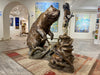 Repentance bronze sculpture by artist Walt Horton bear and boy