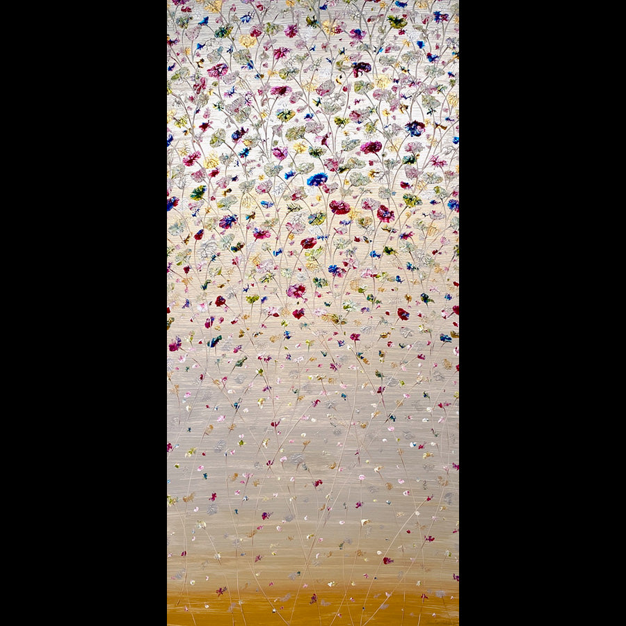 Joy_s-return-Artist-Pamela-Sukhum-A vertical painting featuring a dense field of small multicolored flowers on a textured off-white background, fading to a warm gold band at the bottom.