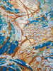 Sky-Dancer-Artist-Pamela-Sukhum-Abstract artwork with swirling blue and gold patterns