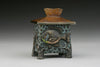 Bronze bluegill vessel by Colorado artist James Moore