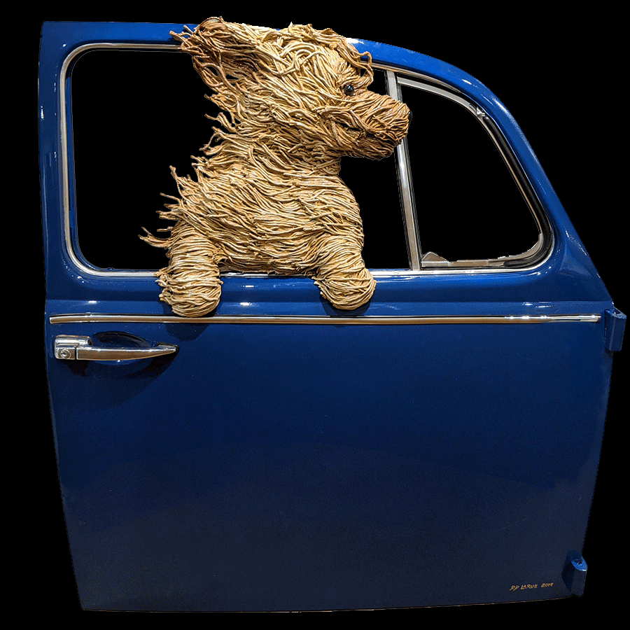 Golden Doodle dog sculpture in a restored authentic Volkswagen bright blue door