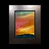 metal framed watercolor painting by artist Kay Stratman of a very colorful sunset sunrise sky - front
