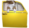dog sculpture in a volkswagen door by artist dd larue sculpture