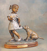 Tug of Love bronze sculpture by artist Marianne Caroselli 