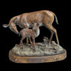 Natures Gift bronze deer sculpture by artist Marianne Caroselli